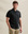 The Model is 187 cm and wears size M