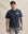Het model is 187 cm en draagt M