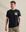 Het model is 189 cm en draagt M