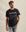 The Model is 187 cm and wears size M
