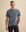 Het model is 190 cm en draagt M