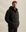 The Model is 187 cm and wears size M