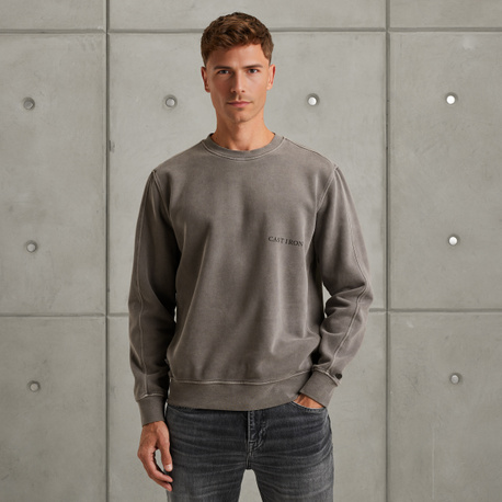 Sweatshirt with off-placed logo