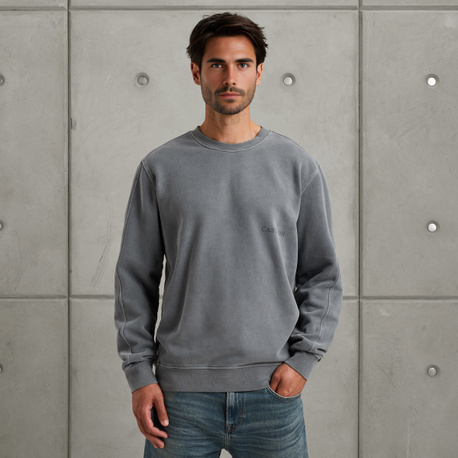 Sweatshirt with off-placed logo