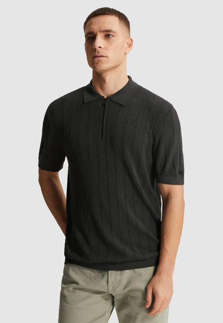 Polo met ritssluiting en allover structuur