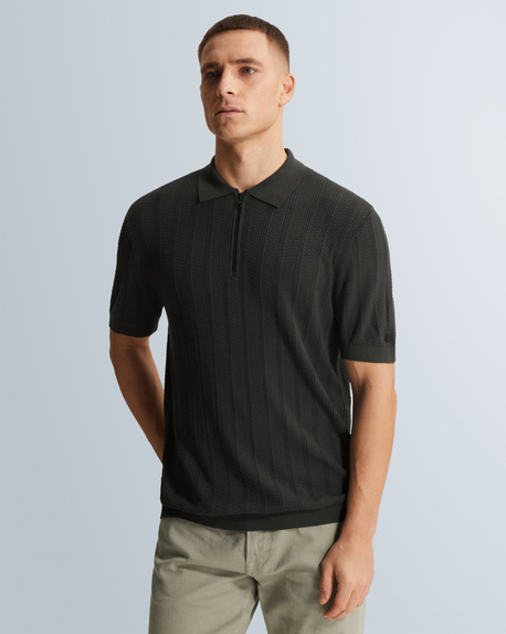 Polo met ritssluiting en allover structuur