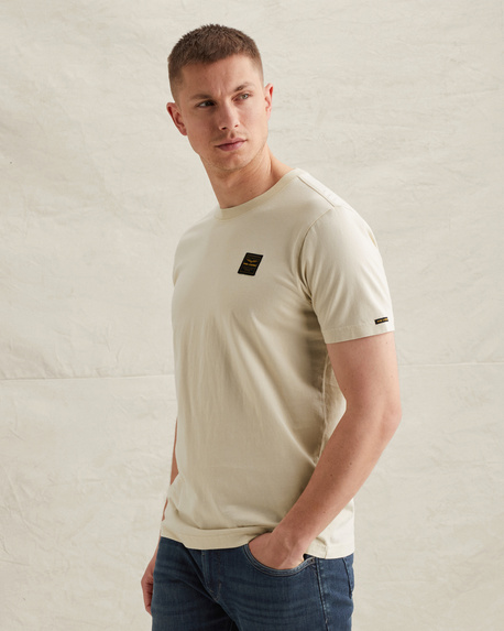 T-shirt with a garment-dye wash and badge