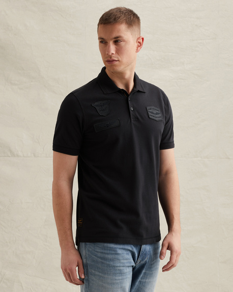 Polo shirt with badges and ribbed collar