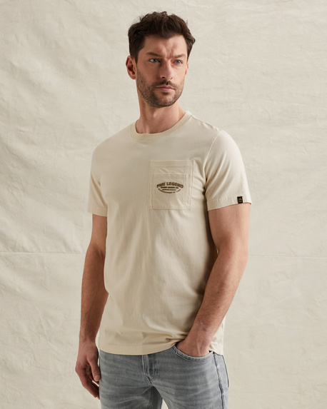 T-shirt with artwork on the chest pocket