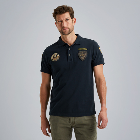 Polo shirt with badges