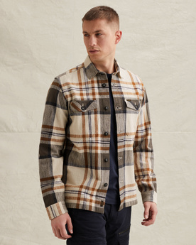 Shirt with check pattern and badge